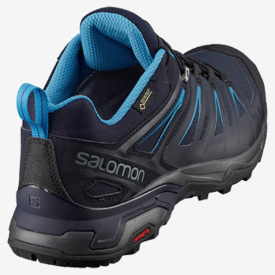 Les chaussures de randonnée de la marque Salomon, portées par